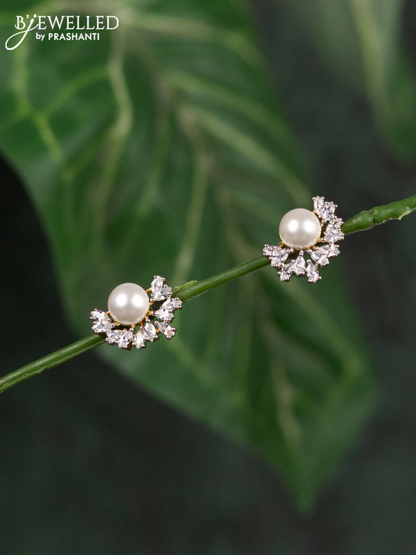 Zircon earrings with cz stones and pearl in gold finish