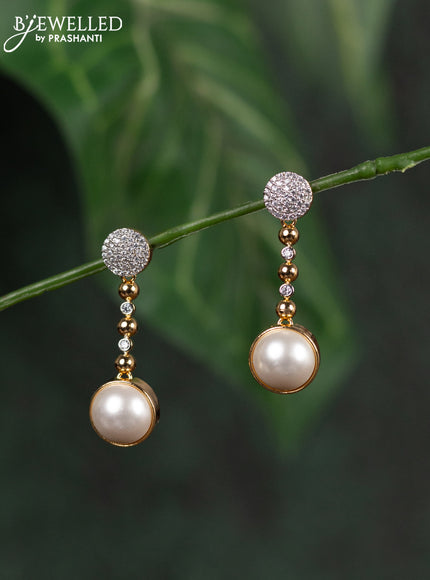 Zircon earrings with cz stones and pearl in gold finish