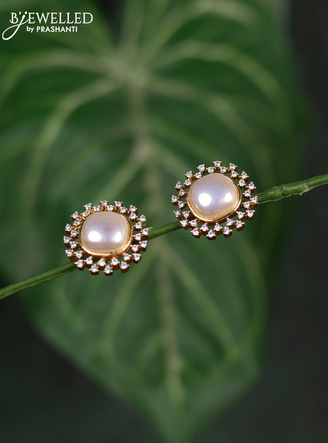 Zircon earrings with cz stones in gold finish