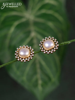 Zircon earrings with cz stones in gold finish