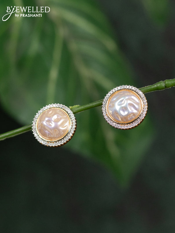 Zircon earrings with cz stones in gold finish