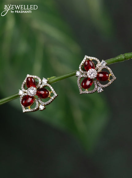 Zircon earrings with maroon beads and cz stones in gold finish