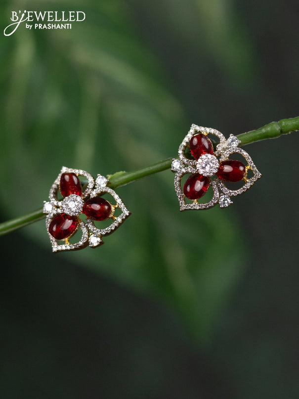 Zircon earrings with maroon beads and cz stones in gold finish