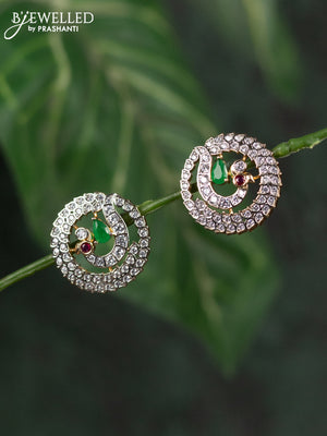 Zircon earrings peacock design with emerald and cz stones in gold finish