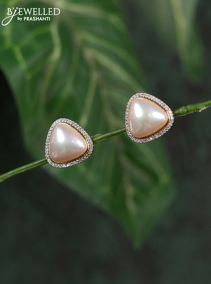 Zircon earrings with cz stones in gold finish