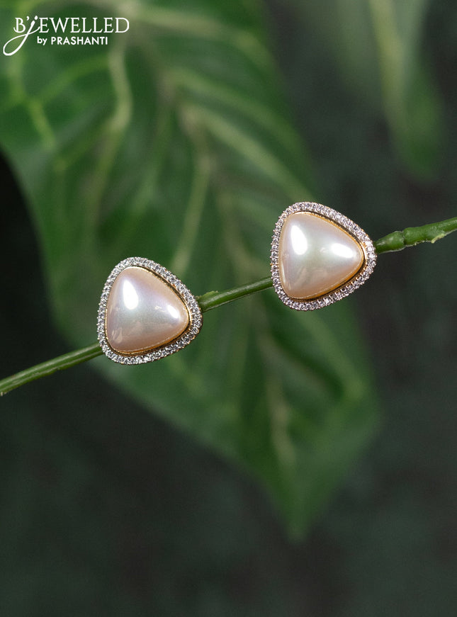 Zircon earrings with cz stones in gold finish
