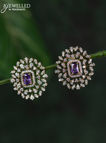 Zircon earrings with purple and cz stones in gold finish