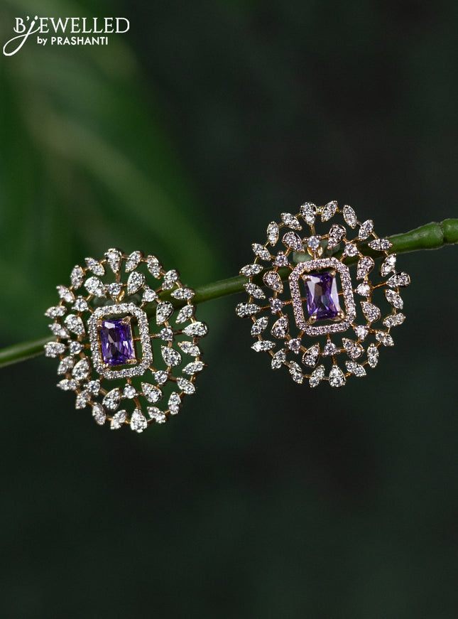 Zircon earrings with purple and cz stones in gold finish