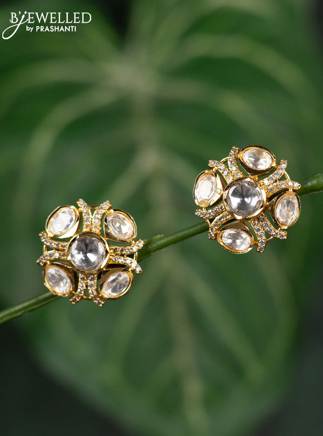 Zircon earrings with kundan and cz stones in gold finish