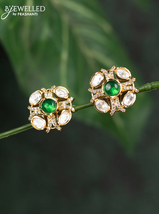 Zircon earrings with emerald & kundan and cz stones in gold finish