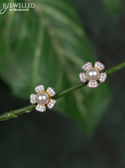 Zircon earrings floral design with cz stones and pearl in gold finish