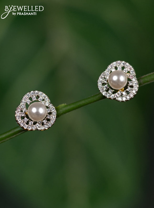 Zircon earrings with cz stones and pearl in gold finish