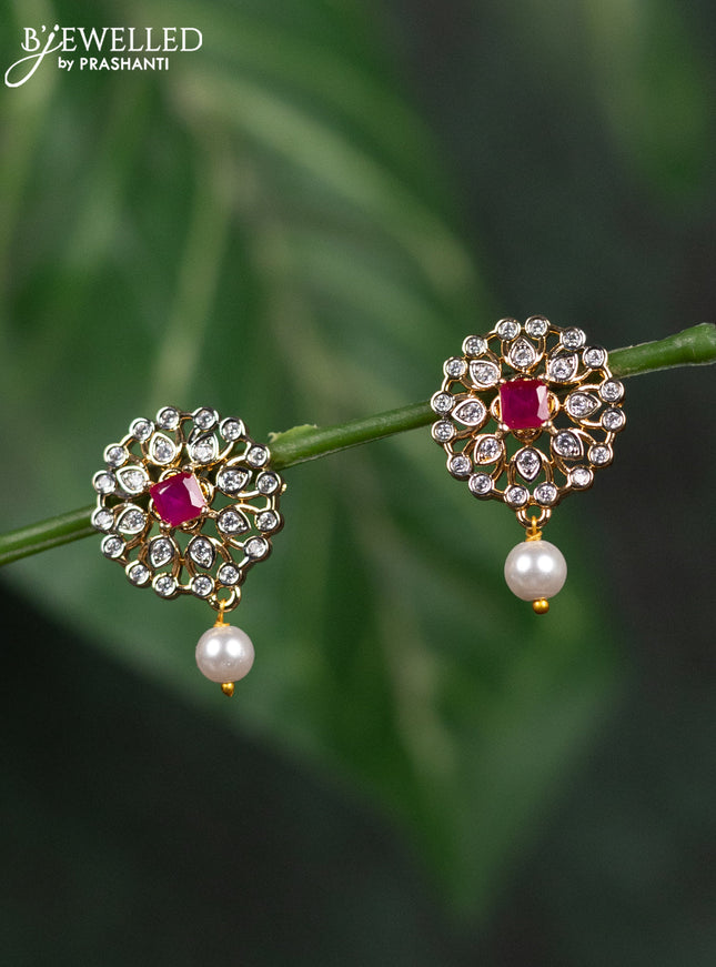Zircon earrings with ruby & cz stones and pearl hanging in gold finish