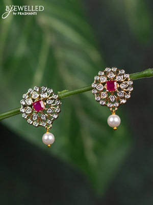 Zircon earrings with ruby & cz stones and pearl hanging in gold finish