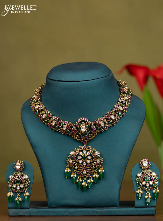 Necklace with kemp & kundan stones and pearl & green beads hangings in victorian finish
