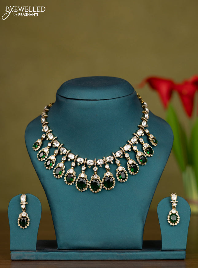Necklace with emerald and kundan cz stones in victorian finish