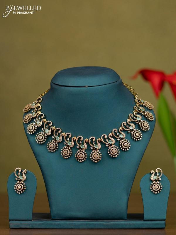 Necklace peacock design with mint green and cz stones in victorian finish