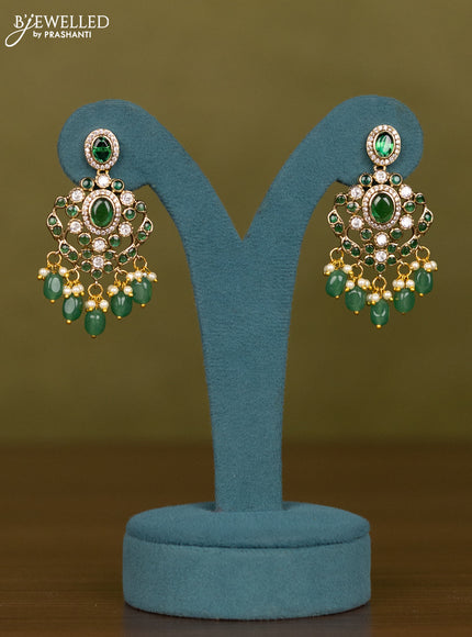 Necklace with emerald & kundan cz stones and green beads hangings in victorian finish