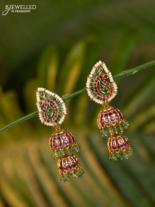 Antique double layer jhumka with kemp stones and mint green beads hangings