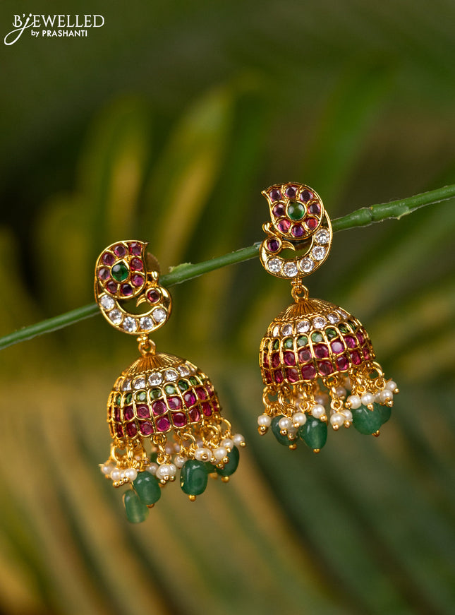 Antique jhumka peacock design with kemp & cz stones and pearl & green beads hangings