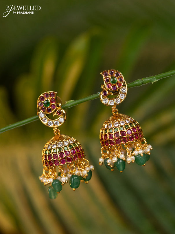 Antique jhumka peacock design with kemp & cz stones and pearl & green beads hangings