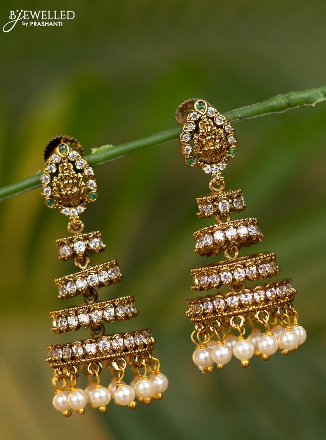 Antique multilayer jhumka lakshmi design with emerald & cz stones and pearl hangings