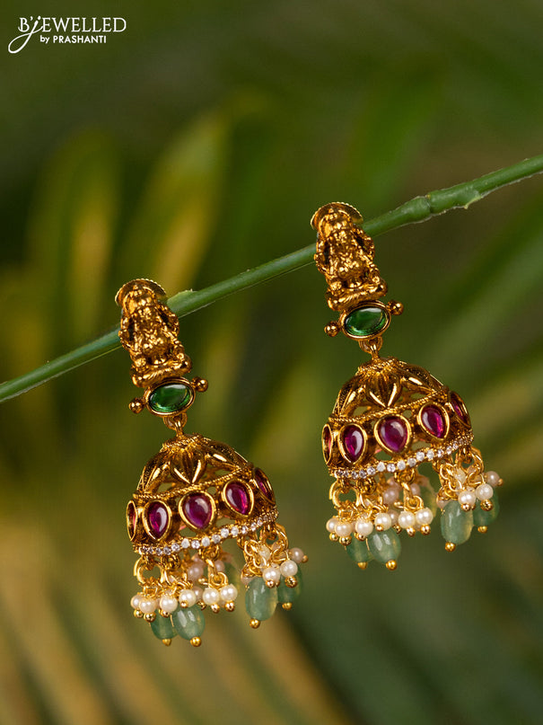 Antique jhumka lakshmi design with kemp & cz stones and pearl & mint green beads hangings