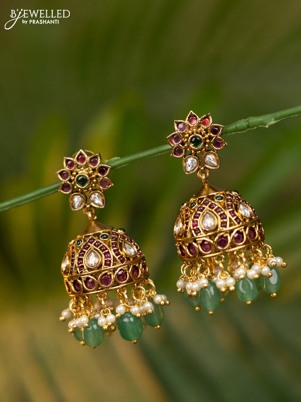 Antique jhumka floral design with kemp & kundan stones and pearl & mint green beads hangings