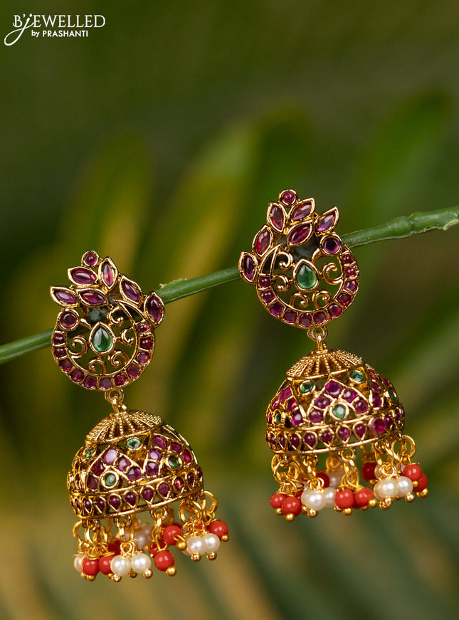 Antique jhumka peacock design with kemp stones and pearl & red beads hangings