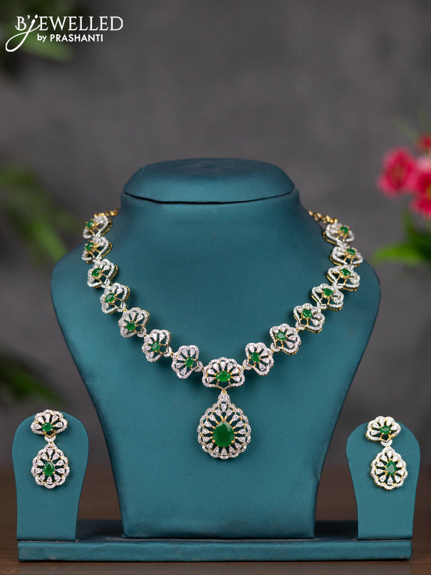 Zircon necklace with emerald and cz stones in gold finish