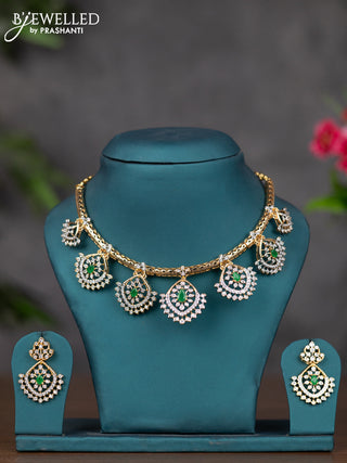 Zircon necklace with emerald and cz stones in gold finish