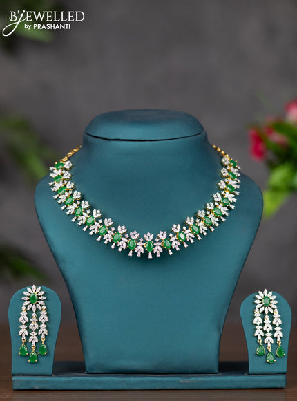 Zircon necklace with emerald and cz stones in gold finish