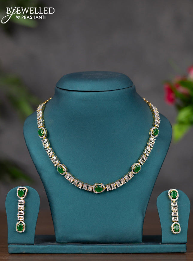 Zircon necklace with emerald and cz stones in gold finish