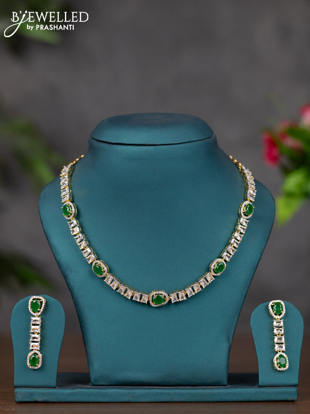 Zircon necklace with emerald and cz stones in gold finish