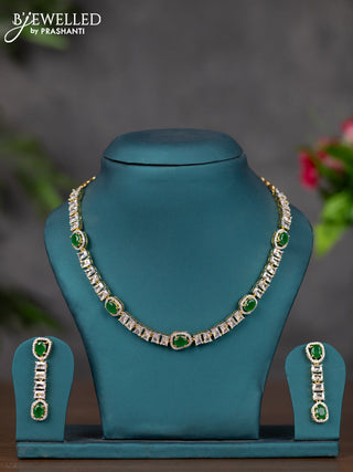 Zircon necklace with emerald and cz stones in gold finish