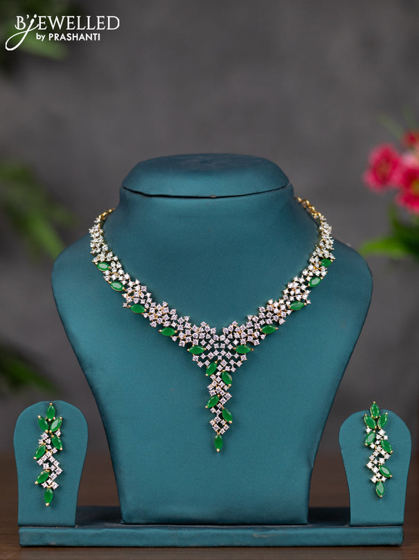 Zircon necklace with emerald and cz stones in gold finish