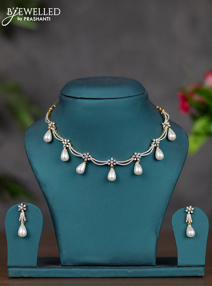 Zircon necklace with cz stones and pearl hangings in gold finish