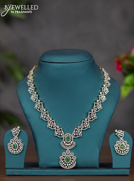 Zircon necklace with emerald and cz stones in gold finish