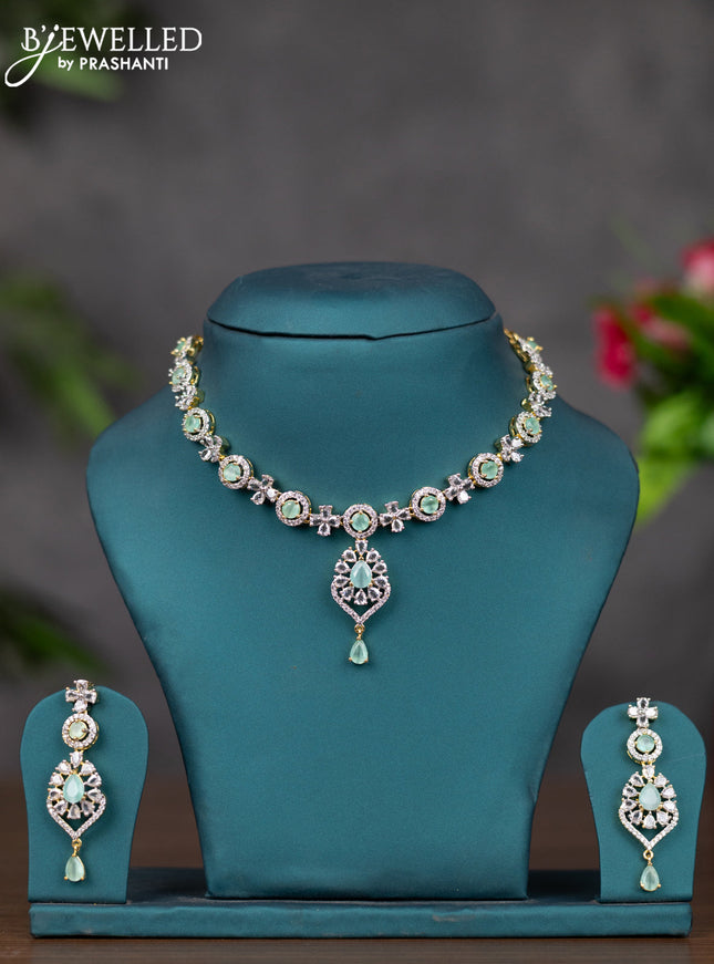 Zircon necklace with mint green and cz stones in gold finish