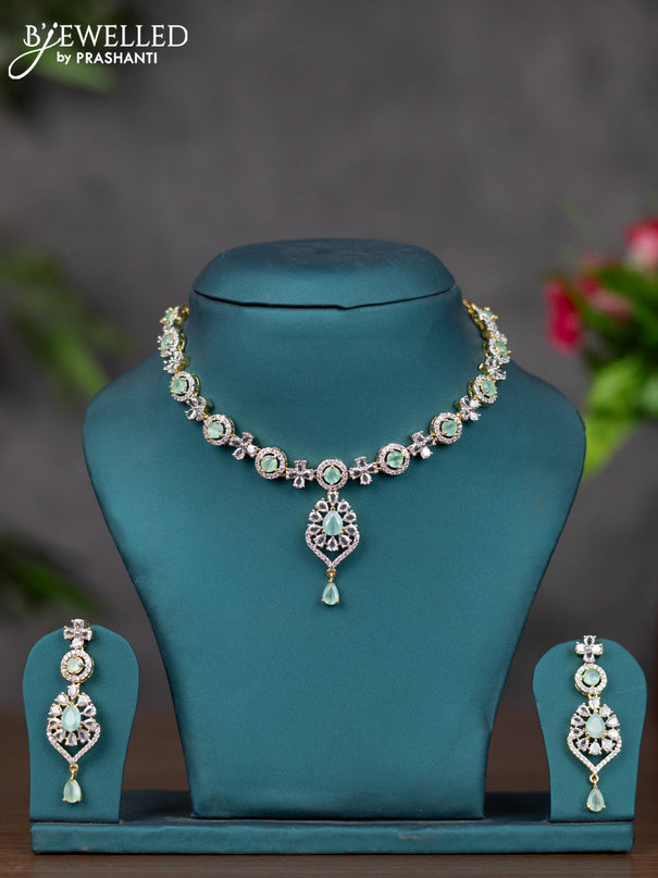 Zircon necklace with mint green and cz stones in gold finish