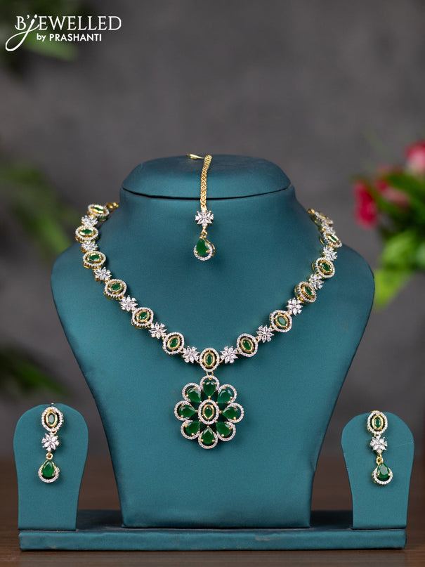 Zircon necklace with emerald and cz stones in gold finish