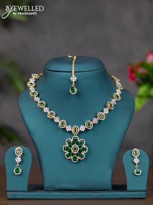 Zircon necklace with emerald and cz stones in gold finish