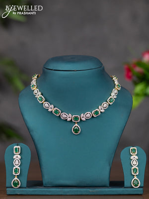 Zircon necklace with emerald and cz stones in gold finish
