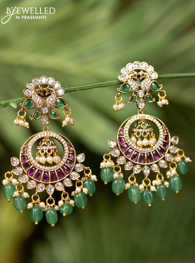 Antique earrings peacock design with kemp & cz stones and pearl & mint green beads hangings