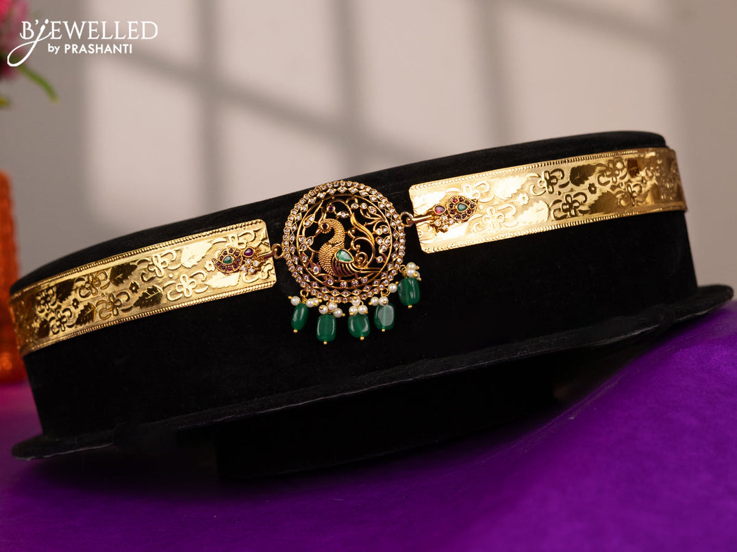 Antique self embossed hip belt peacock design with emerald & cz stones and pearl & green beads hangings