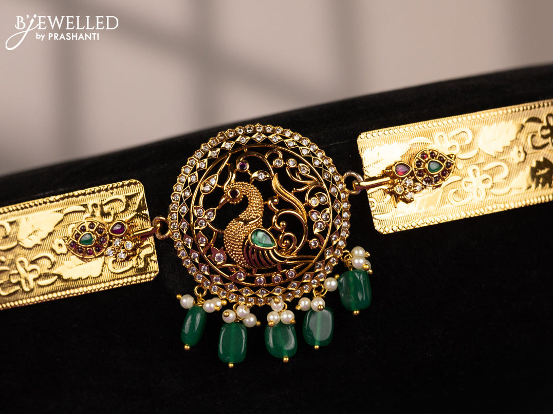 Antique self embossed hip belt peacock design with emerald & cz stones and pearl & green beads hangings