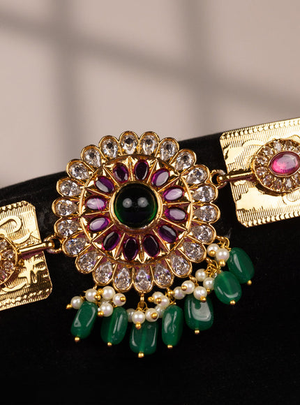 Antique self embossed hip belt with kemp & kundan stones and pearl & green beads hangings