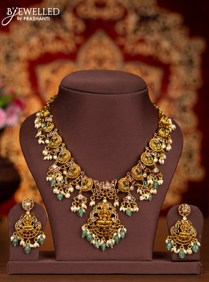 Antique necklace lakshmi pendant with kemp & kundan stones and pearl & mint green beads hangings