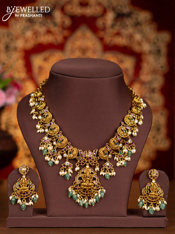 Antique necklace lakshmi pendant with kemp & kundan stones and pearl & mint green beads hangings