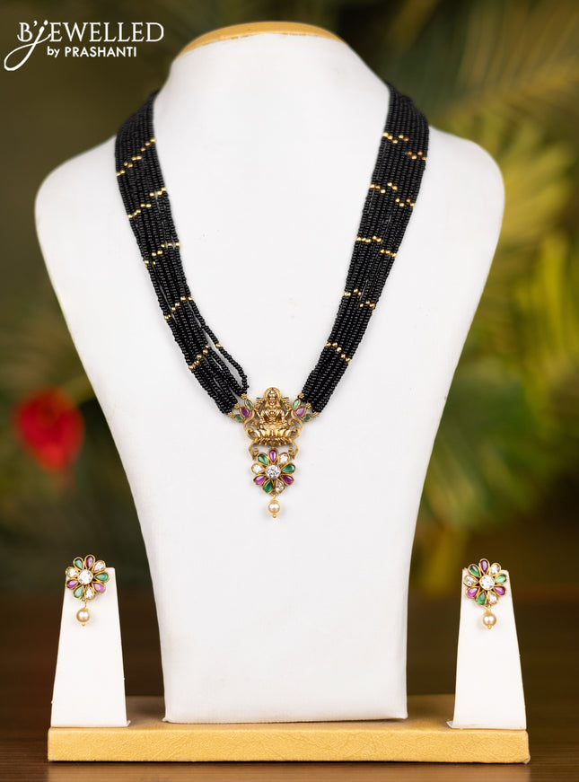 Beaded multilayer black necklace lakshmi pendant with kemp & kundan stones and pearl hanging